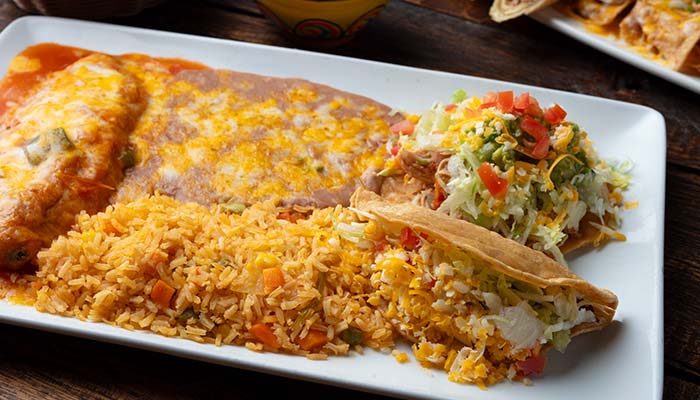 Enjoy our Mexican plate at Mi Guadalajara Restaurant in Escondido, with tacos, rice, and beans.