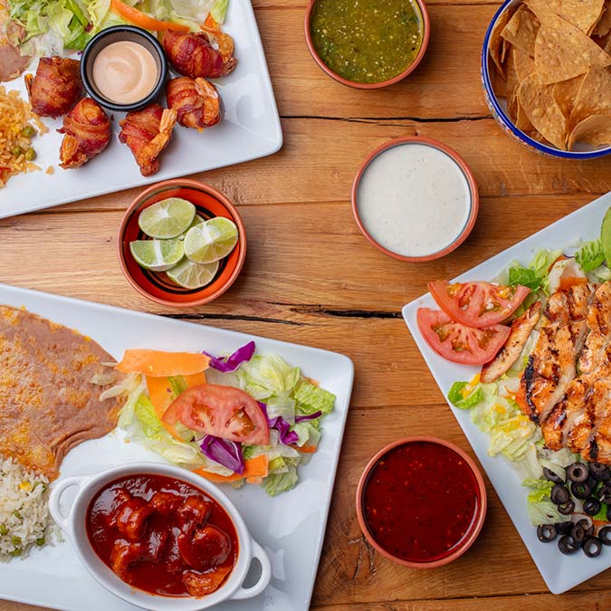 Savor authentic Mexican Food at Mi Guadalajara Restaurant—chips, grilled chicken, and fresh salsas.